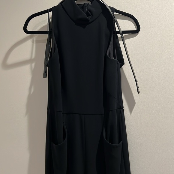 Black jumpsuit with pockets and cut out back - Picture 2 of 4